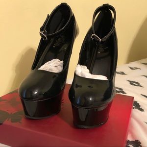 Black 6 in” Mary Jane platform Pleaser heels.